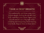 The maroon card with gold accents from Spells: A Little Deck of Enchantments by Lorriane Anderson (Simon & Schuster) reads: “Take a Deep Breath. Sit comfortably and close your eyes. Inhale deeply… Let out a big sigh as you exhale, releasing stress and inviting witchy inspiration into your day. Repeat three or four times.”.