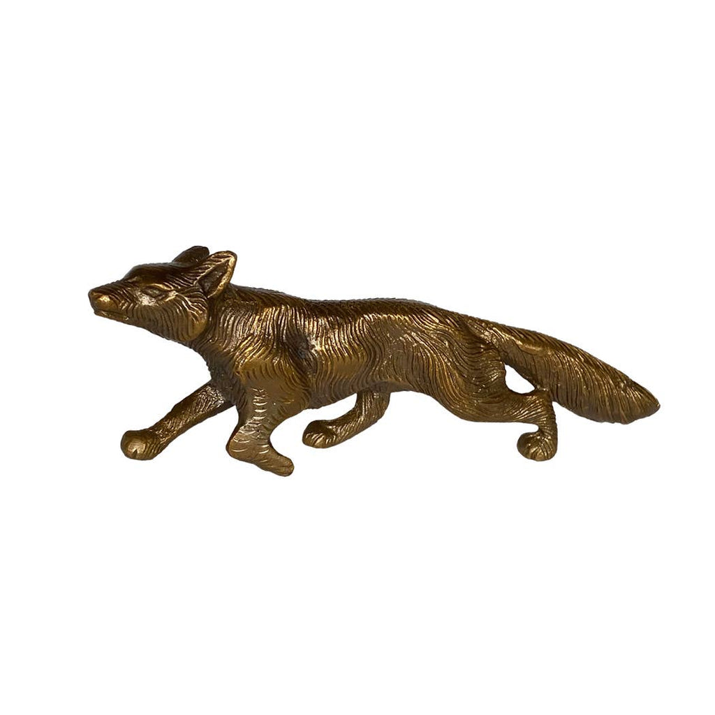 The Madison Bay Co. Solid Antiqued Brass Running Fox Tabletop Desk Decor features detailed fur texture and an extended tail—a unique accent or paperweight inspired by historical home decor reproductions.
