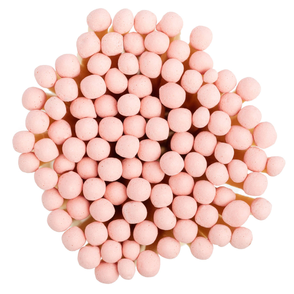 Enlighten the Occasion's Pink Matches in Corked Vial are shown tightly clustered with rounded, pink tips, viewed from above against a white background.