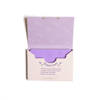 The 123 Farm Paper Soap – Lavender Scent, Travel Size (50 Sheets) features a light purple packet with lavender designs and directions inside the lid, showing a fragrant stack of cleansing soap sheets on a white background.