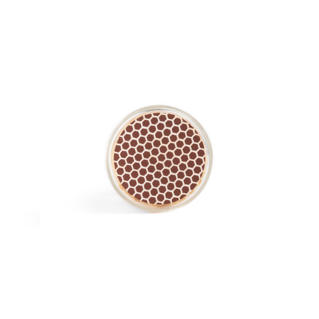Against a white background, Enlighten the Occasion's Pink Matches in a Corked Vial are displayed, their round tips featuring a brown honeycomb pattern that resembles textured matchstick heads.