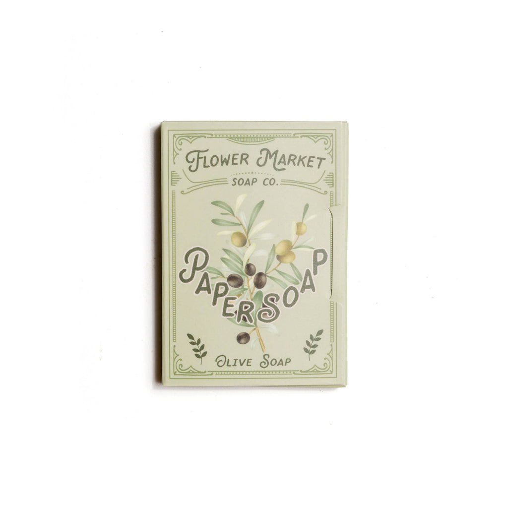 The 123 Farm Paper Soap – Olive Oil, Travel Size (50 Sheets) comes in a compact pack with olive branch designs on a pale green background—ideal portable hand soap for freshening up anywhere.
