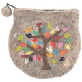 The Benjamin International Tree Of Life Embroidered Change Purse is a small, round brown felt pouch with a zipper, pom-pom top, and colorful leaf-accented Tree of Life embroidery—blending style and function in a unique accessory.