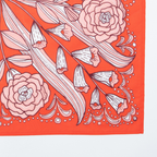 The No. 105 Greta Bandana by Handker Bandanas is a red premium cotton accessory with bold floral motifs—large roses, tulip-like flowers, green leaves, and decorative white dots—symmetrically arranged and hand screen-printed for vibrant detail.