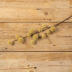 The Ragon House Faux MUSTARD GLOBE THISTLE SPRAY features yellow globe-like accents, bringing a vibrant touch to any arrangement.