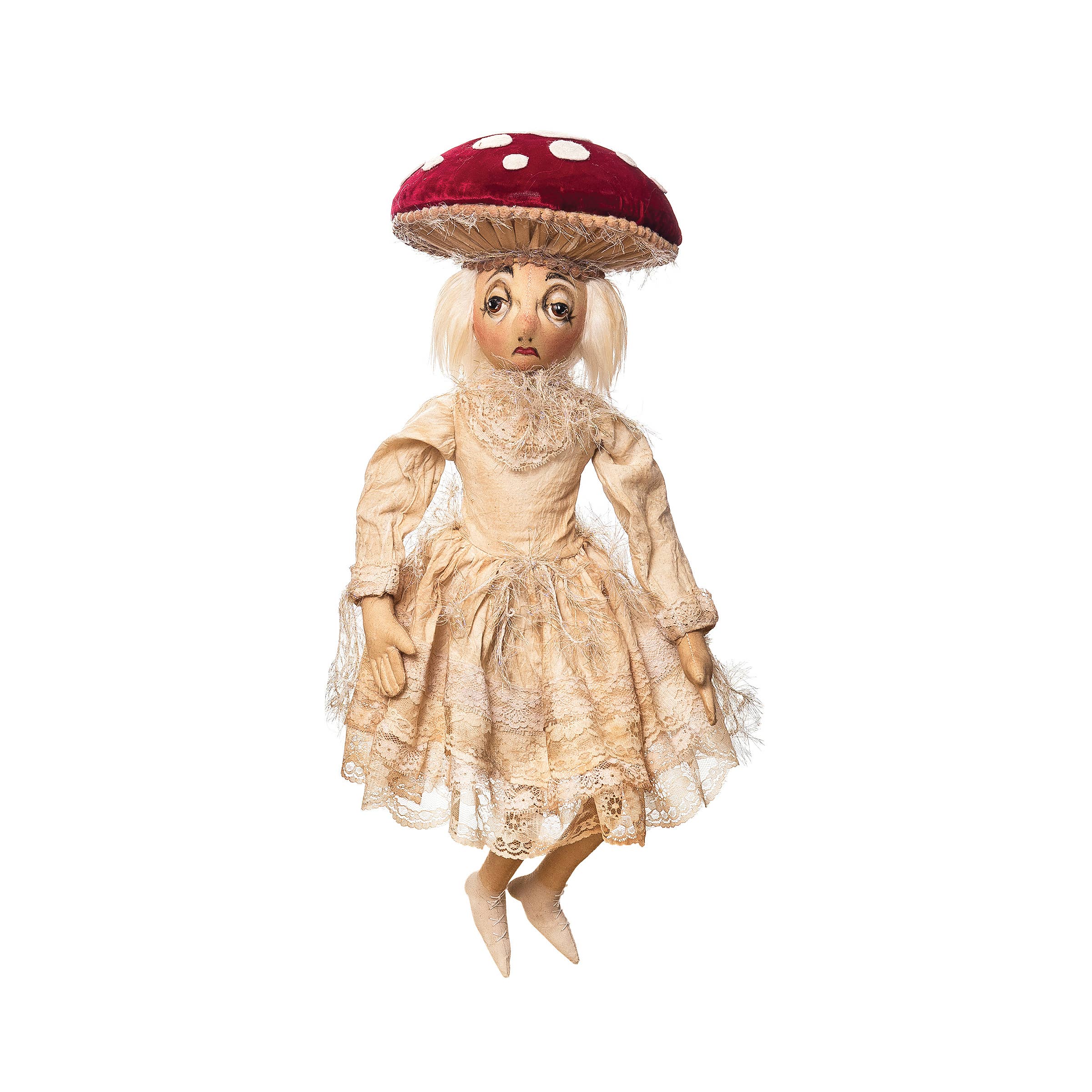 The C&F Home Myra Mushroom Gathered Traditions Art Doll features a sad expression, vintage lace dress, large red mushroom cap hat, light hair, and elongated limbs, perfect for unique décor.