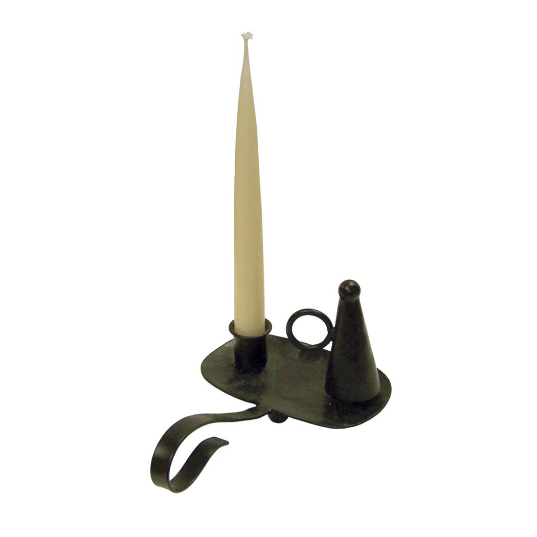 The Madison Bay Co. Iron Chamberstick with Snuffer—Early American Style—holds a tall white candle and features a handle and matching snuffer, making it a perfect rustic accent or historical reproduction for your home.