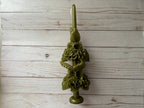 Olive Green Large Oaxaca Marigold Candle, a handmade olive green taper candle decorated with sculpted marigold flowers.