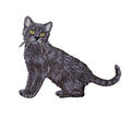 The Black Cat Realistic Full Body Kitten Embroidered Iron on Patch by Wholesale Applique features a lifelike black cat with yellow eyes, detailed fur, and curled tail, perfect for pet lovers to apply on clothing or bags.