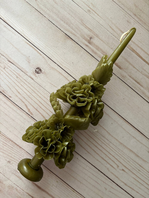 Olive Green Large Oaxaca Marigold Candle, a handmade olive green beeswax taper decorated with sculpted flower clusters along its length.