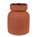 The Kosta Vase by HomArt features a reddish-brown terra cotta cement body with a wide shape, narrow neck, and flared rim. Its textured, speckled exterior has a rough finish, while the darker interior is smooth.