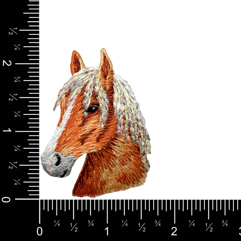 The Chestnut Horse Head - Facing Left Iron on Patch by Wholesale Applique shows a brown horse with a white mane and measures about 2" tall by 1.5" wide.