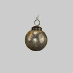 A 2" SILVER CRACKLE KUGEL BLING ornament by Ragon House, featuring a slightly tarnished, textured surface, hangs against a plain light gray background.