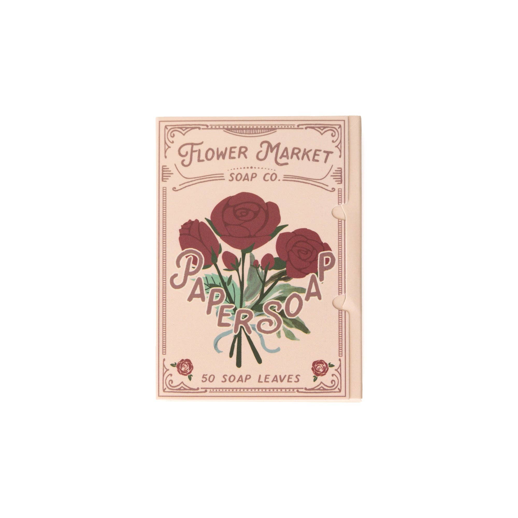 A beige packet labeled 123 Farm Paper Soap – Rose Scent, Travel Size, 50 Sheets features red roses and green leaves. The eco-friendly packaging contains 50 handwashing sheets.