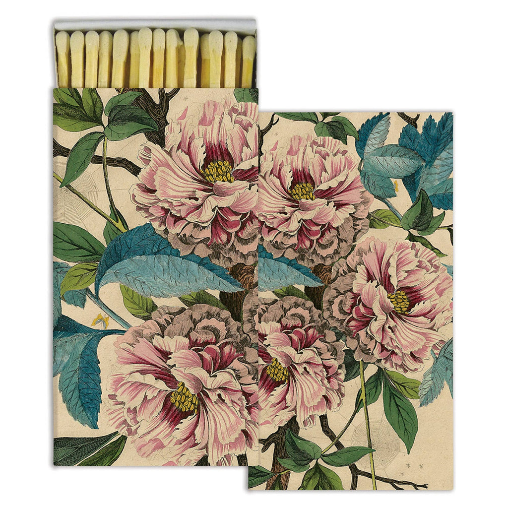 The Matches - French Peony by HomArt feature large pink and white flowers with green leaves and blue accents on a light box. Partially open to reveal yellow-tipped safety matches, it’s a charming hostess gift for any occasion.