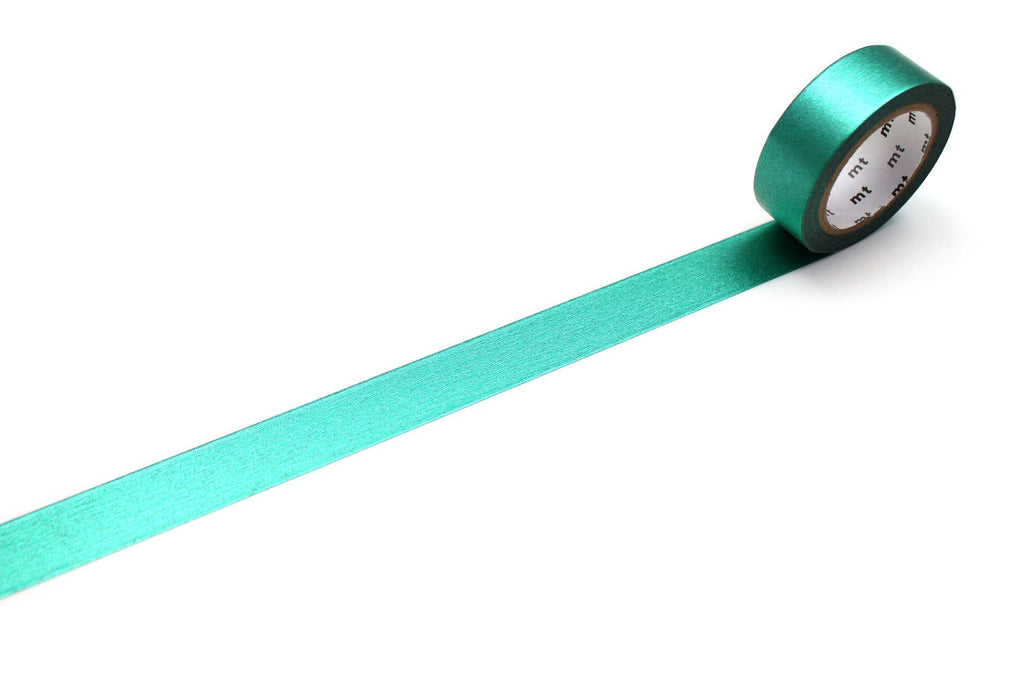 A roll of mt masking tape (Sweet Bella) High Brightness Green washi tape with a strip extended across a white surface.