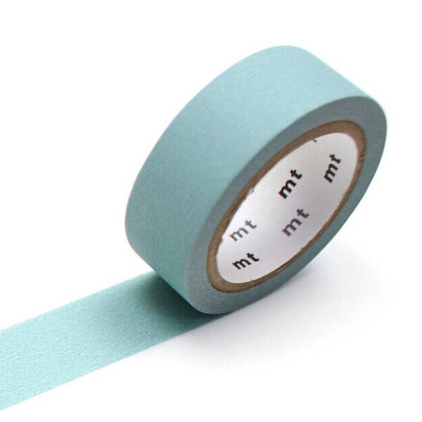 A roll of Washi Tape: Matte Smoky Mint in matte mint green.