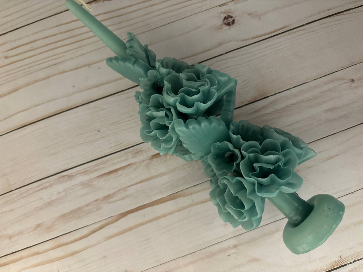Beeswax Large Sage Oaxaca Marigold candle in sage green, adorned with sculpted flower blossoms.