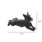 The HomArt Terrier Door Wedge is a small, antique brown cast iron door stop shaped like a playful terrier in a stretching pose, measuring 6.5" long by 3.25" high—perfect for adding charm to any doorway.