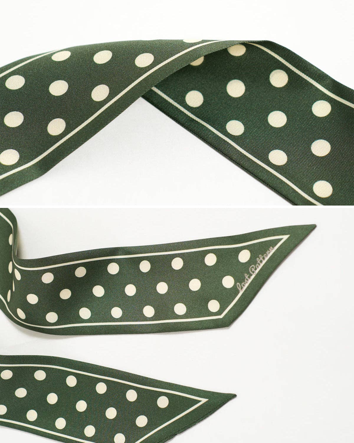 The Silk Skinny Scarf: Dark Green by Lost Pattern NYC is shown in close-up, featuring green polka dot mulberry silk with a thin white border, pointed ends, and a cursive logo near one tip for added elegance.