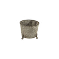 The Silver Tree Home & Holiday A00558 is a 5.5in round metal planter with an antique galvanized finish, gray textured sides, and three short decorative cast iron feet, shown on a white background.