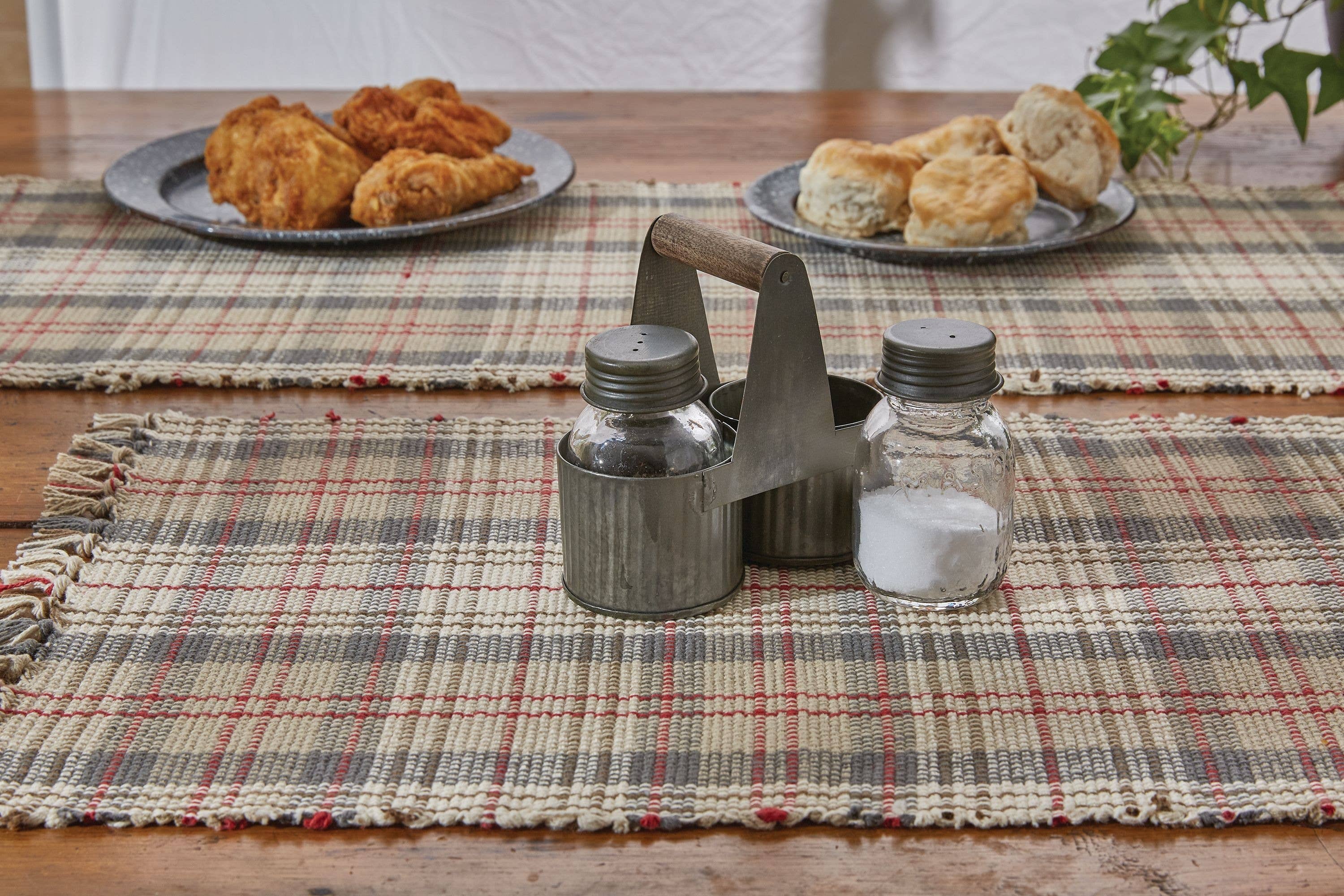 The Norwood Caddy with Glass Salt & Pepper by Park Designs keeps your shakers neatly organized and stylishly displayed on any table.