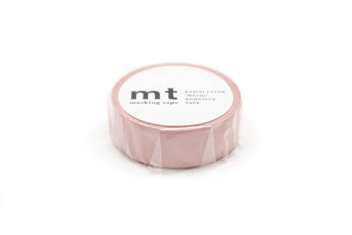 A roll of mt Washi Tape: Pastel Scarlet, wrapped in clear plastic, featuring a round label on top with mt and product text printed in black.