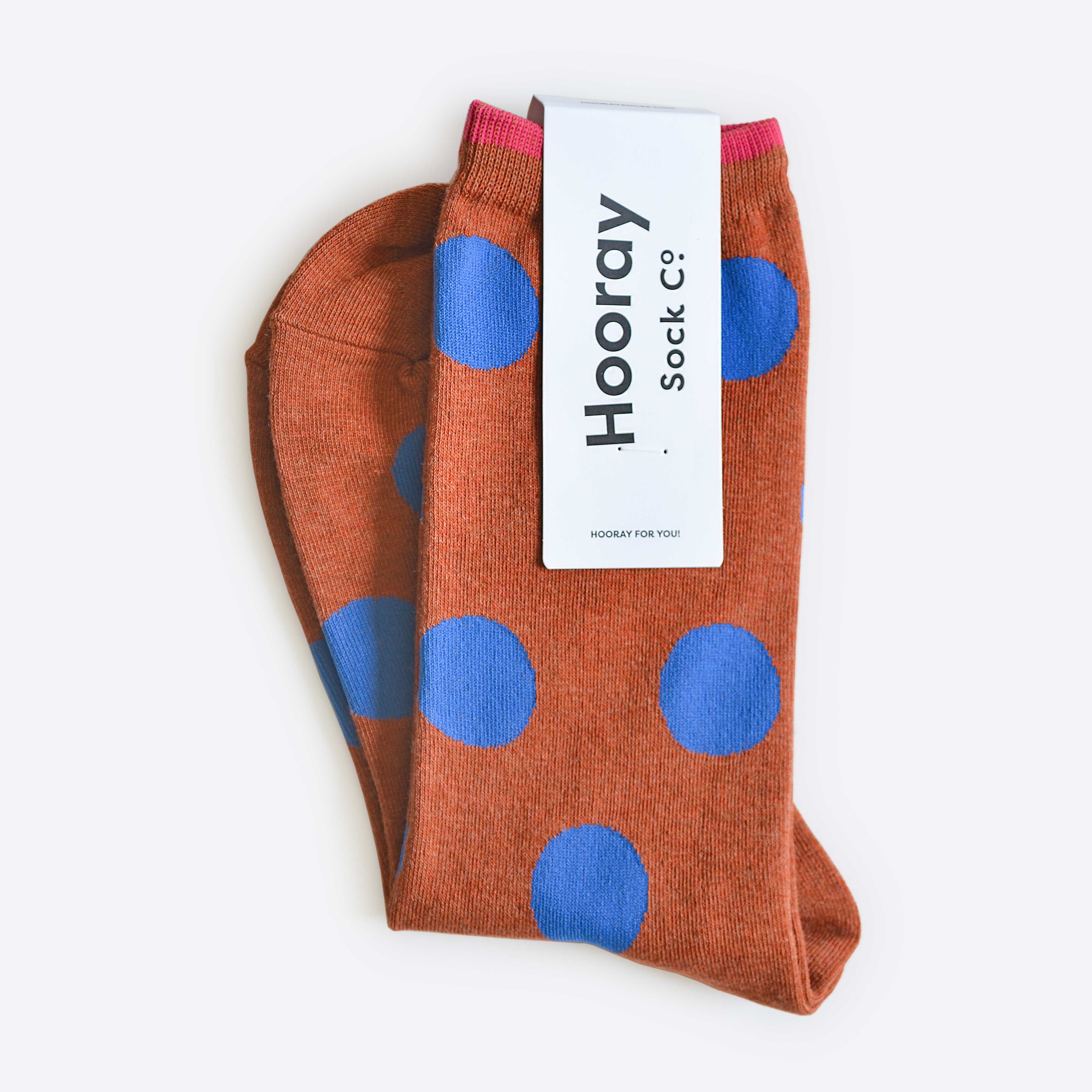 Panhandle Polka Dot Crew Socks by Hooray Sock Co.: Brown and blue unisex crew socks with large polka dots, folded with a label reading "Hooray Sock Co." on top and "HOORAY FOR YOU!" at the bottom. Fun for everyday wear.