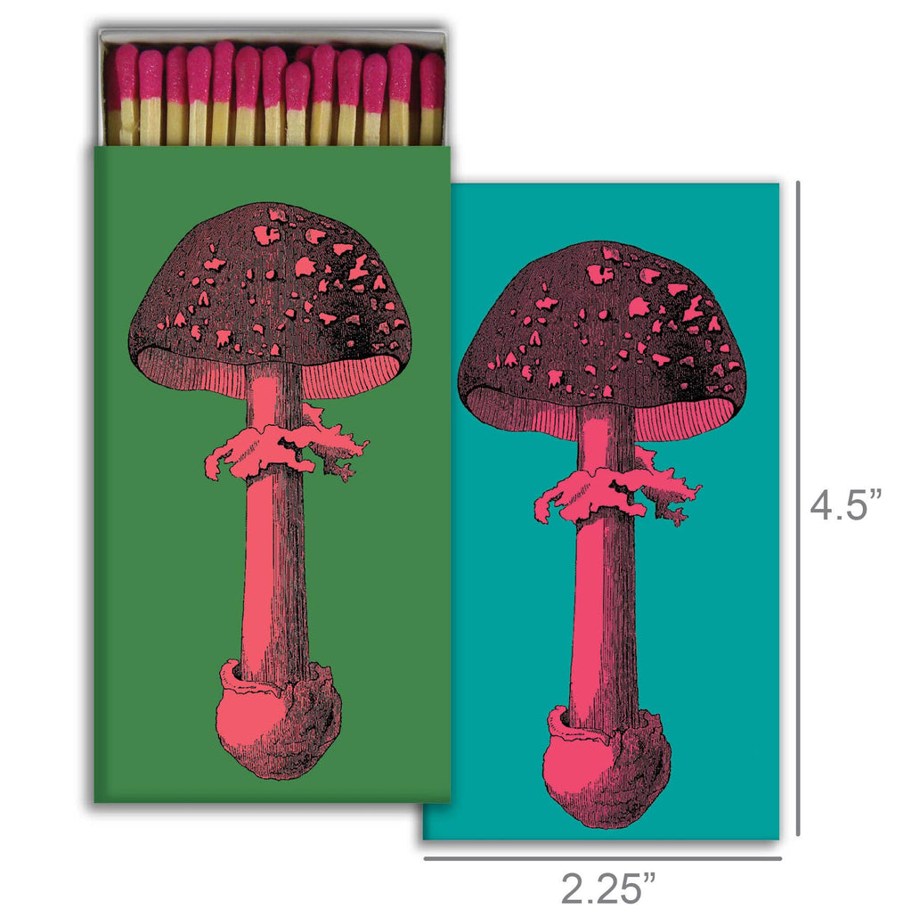 The HomArt Match - Tall Mushrooms box features pink and black mushroom illustrations on green and turquoise, with red-tipped safety matches inside. Measuring 4.5" x 2.25", it’s a stylish decor accent or thoughtful hostess gift.