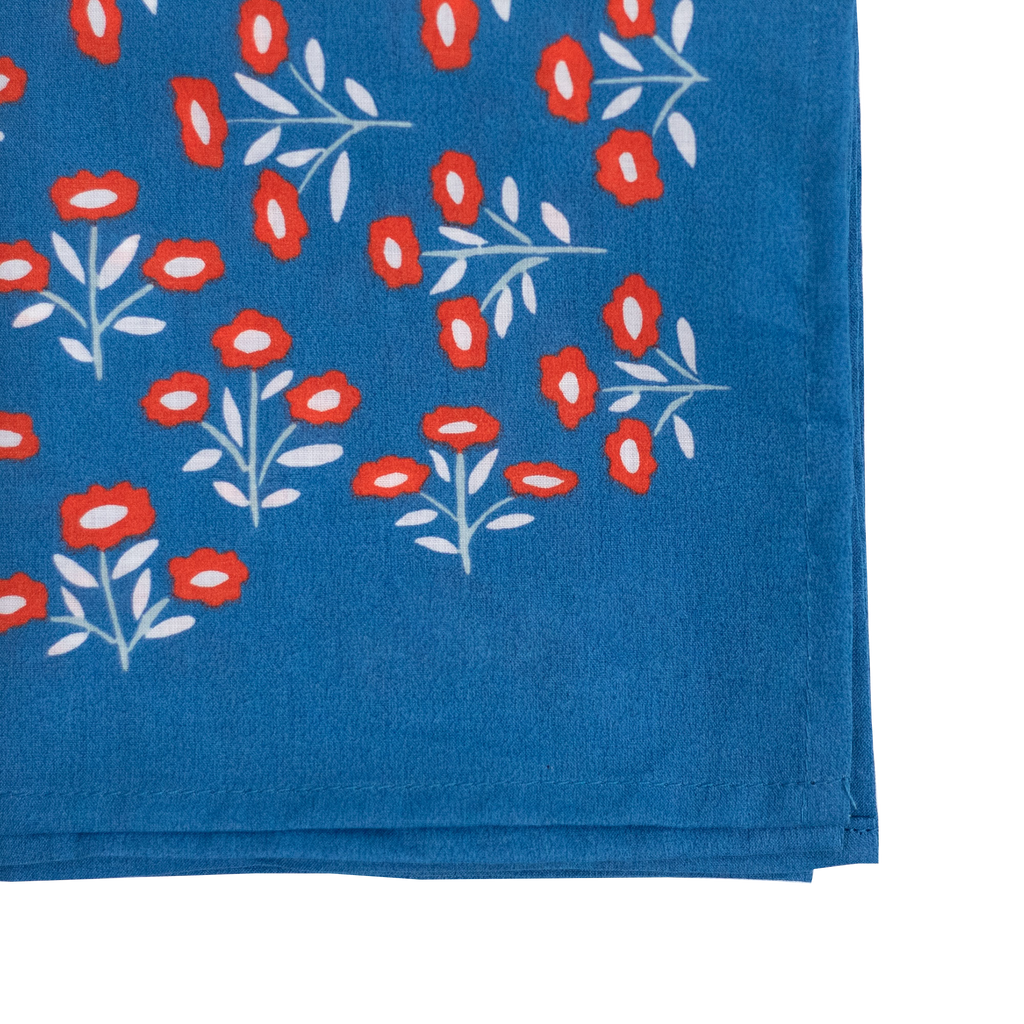 The No. 075 Juliet Bandana by Handker Bandanas features red floral hand screen-printing on premium blue cotton, measuring 22x22 inches.