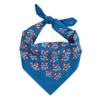 The No. 075 Juliet Bandana by Handker Bandanas is a premium blue cotton bandana featuring a white and red floral pattern, hand screen-printed, folded into a triangle, tied at the top, and measuring 22x22 inches on a plain white background.