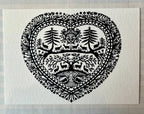 Parcel Papercut Heart Art Cards feature a black and white heart with animals and trees on a 5x7 card, paired with a creamy white envelope.