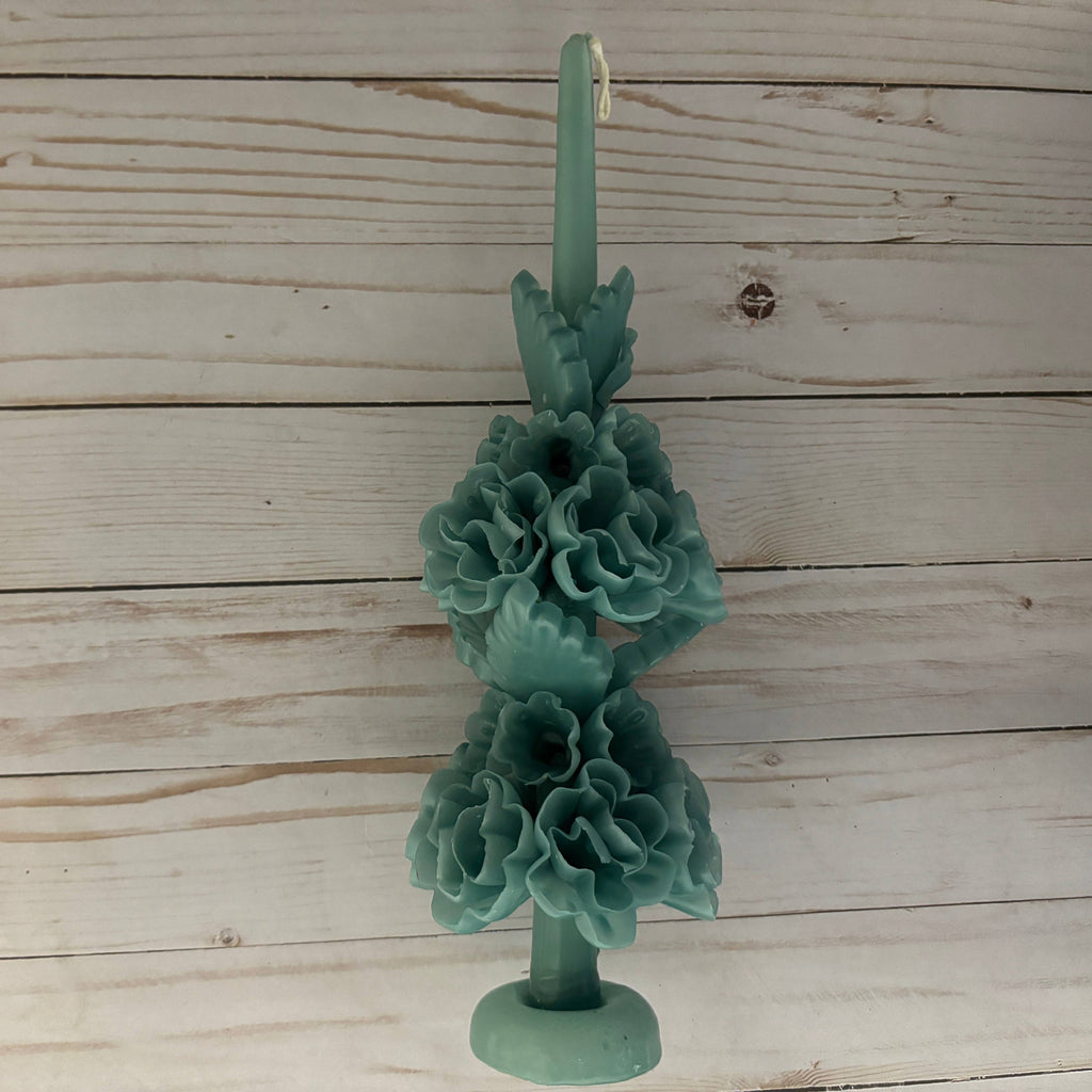 Beeswax Large Sage Oaxaca Marigold Candle, a handmade sage green taper candle featuring two tiers of molded marigold flowers.