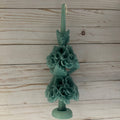 Beeswax Large Sage Oaxaca Marigold Candle, a handmade sage green taper candle featuring two tiers of molded marigold flowers.