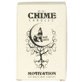 Cream-colored SPIRIT LIGHT CANDLES: MOTIVATION by Benjamin International, Reiki charged and ideal for rituals, feature a black wolf howling at the moon on a swirling tree with "Wolf Spirit" text. Motivation Off-White Mini Candles.
