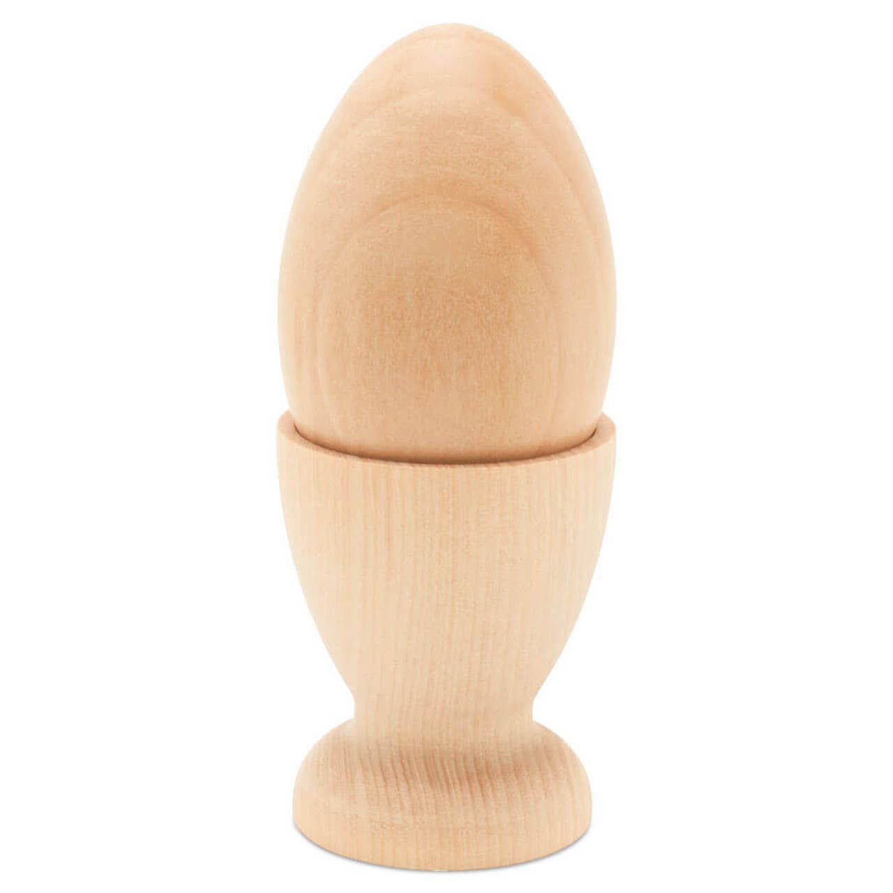 The Wooden Egg Cup Holder by Woodpeckers Crafts displays a smooth, unfinished wooden egg upright in a plain, flat-bottom holder, both with simple designs on a white background.