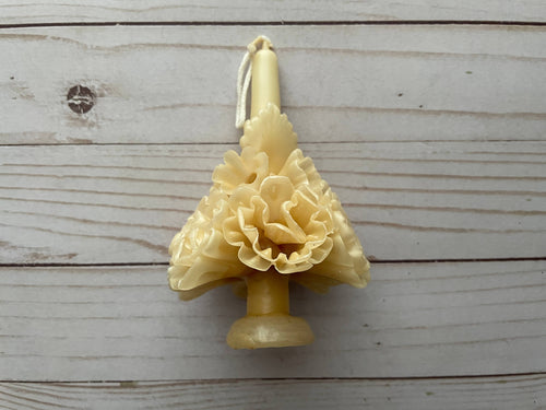 Ivory Oaxaca Marigold Day of the Dead Candle sculpted from beeswax into a medium-sized, tiered, ruffled floral design resembling a marigold.