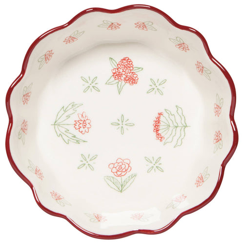 The Camellia Bowl Medium 5.75 inch by Danica Heirloom features white stoneware with a wavy red rim and red and green floral and leaf designs—perfect for rustic farmhouse style.