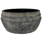 The HomArt Yara Low Planter, Cement - Lrg features a round, wide-mouthed design in dark gray cement with a ribbed upper exterior and matte finish—ideal for rustic garden decor.