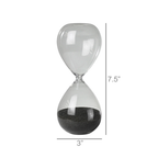 The HomArt Hour Glass - 5 minutes is a clear glass timer with black sand, measuring 7.5 inches tall and 3 inches wide at its widest point.