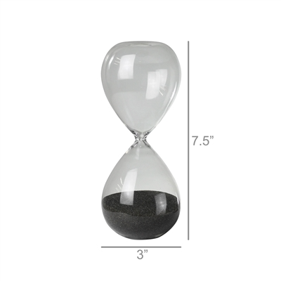 The HomArt Hour Glass - 5 minutes is a clear glass timer with black sand, measuring 7.5 inches tall and 3 inches wide at its widest point.