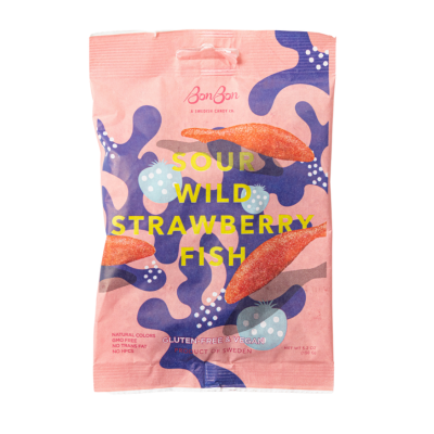 A pink bag of BonBon - A Swedish Candy Co Sour Wild Strawberry Fish, 5.2oz (150g), shows red fish and purple shapes on the label and highlights that it is vegan, gluten-free, and made in Sweden.