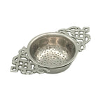 The Madison Bay Co. Nickel Plated Tea Strainer—Antique Vintage Style, 4-1/2”—features ornate handles and a perforated bowl, blending timeless elegance with historical charm for tasteful tea filtering.
