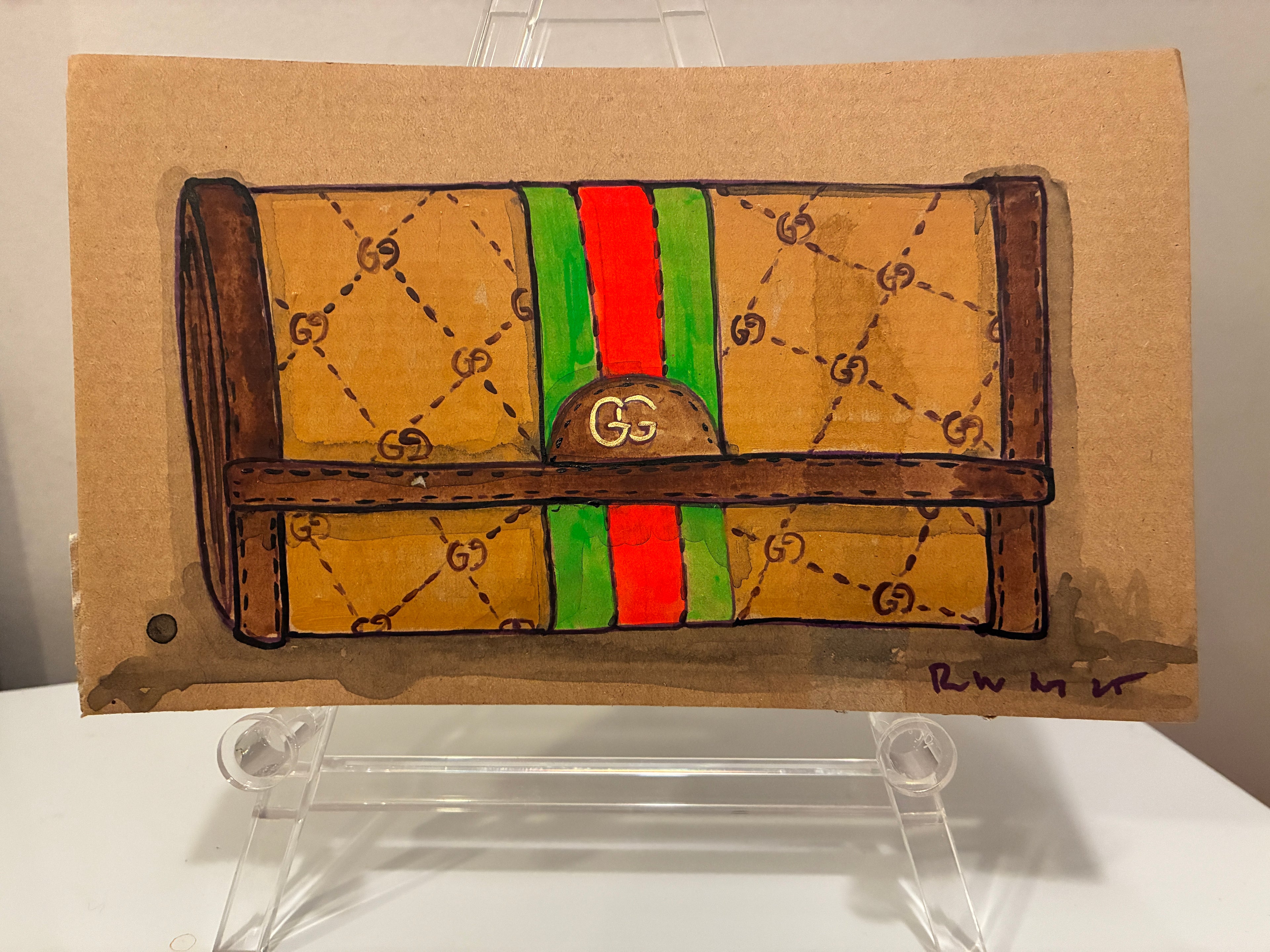 A hand-drawn illustration by Brooklyn artist Rachel Nelson of the Guch wallet, featuring a brown and tan pattern, green and red stripe, and GG logo, displayed on a clear stand. Brand: Thyne Goods.