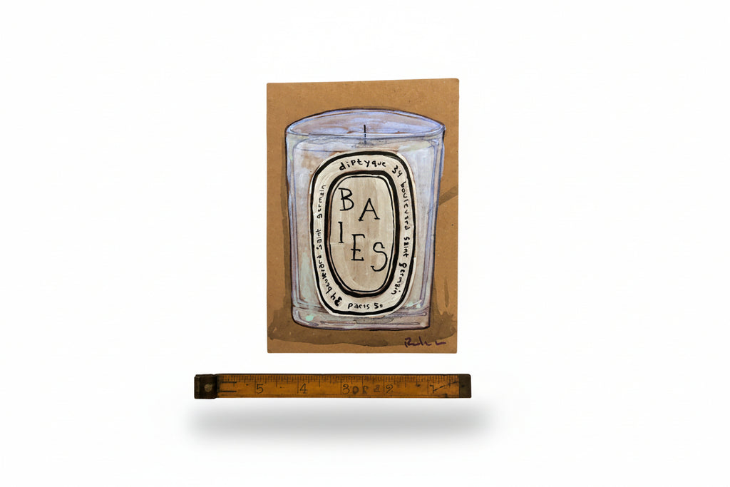 A drawing of the Rachel Nelson • Baies Paris candle by Thyne Goods, on brown paper reminiscent of found cardboard art, is shown upright with a wooden ruler beneath it against a white background.