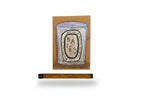 A drawing of the Rachel Nelson • Baies Paris candle by Thyne Goods, on brown paper reminiscent of found cardboard art, is shown upright with a wooden ruler beneath it against a white background.