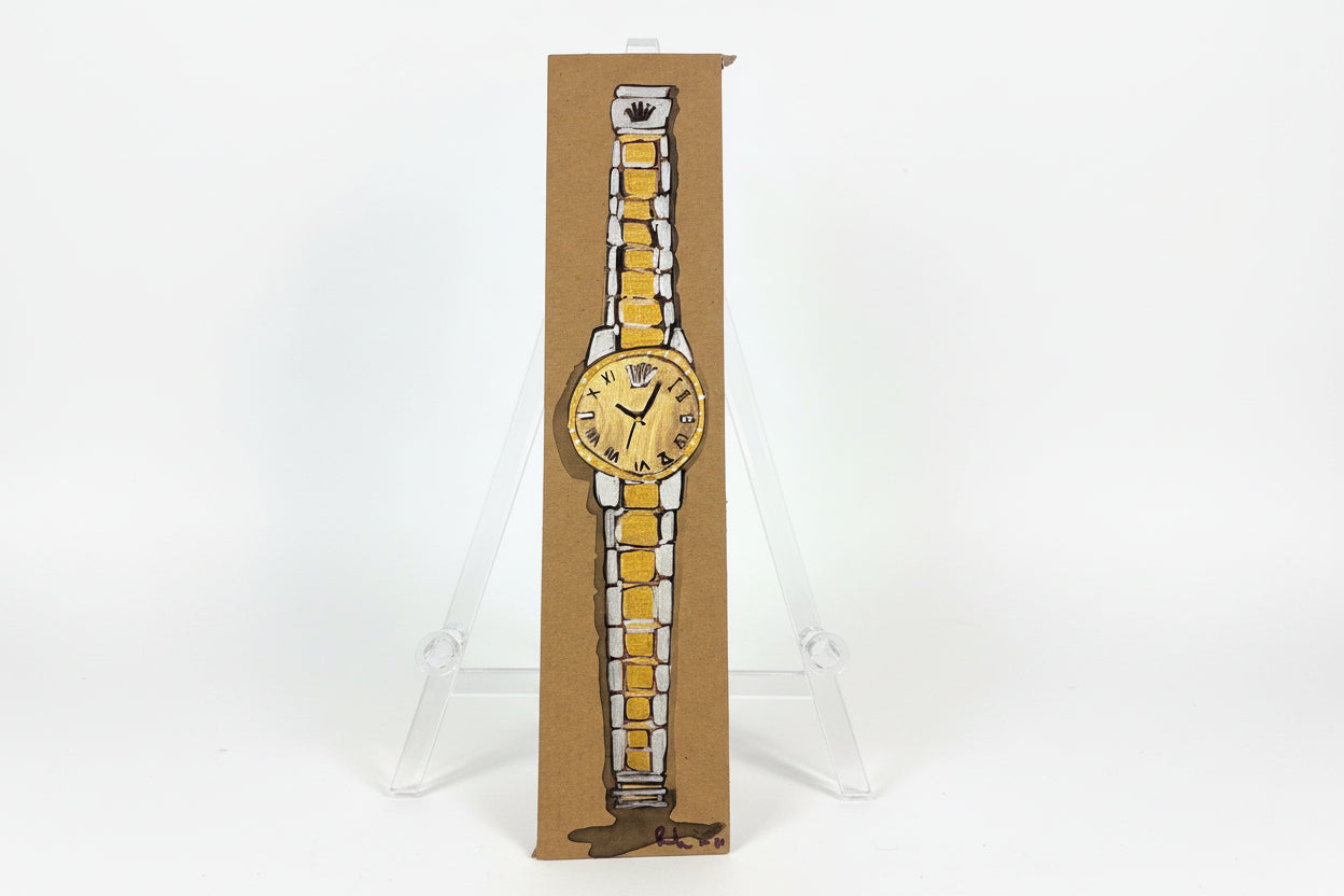 A hand-drawn illustration titled "Rachel Nelson • Watch" by Thyne Goods features a gold and silver wristwatch on brown paper, set upright on a clear easel against a white background, reflecting Rachel Nelson's refined style.