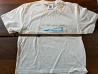 Thyne Goods' limited-edition Cheese cropped tee features a blue cheese wedge graphic and "Its sad without cheese." Printed on 100% cotton, it comes with a wooden ruler displayed horizontally across the front.