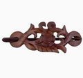 The Benjamin International Wooden Hair Pin features a handcrafted floral and leaf design with a central flower motif and decorative carved details.