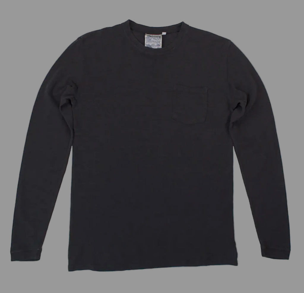 The Baja Long Sleeve Tee by Thyne Goods is a plain black top made from soft hemp cotton, featuring a small left chest pocket and displayed flat on a white background.